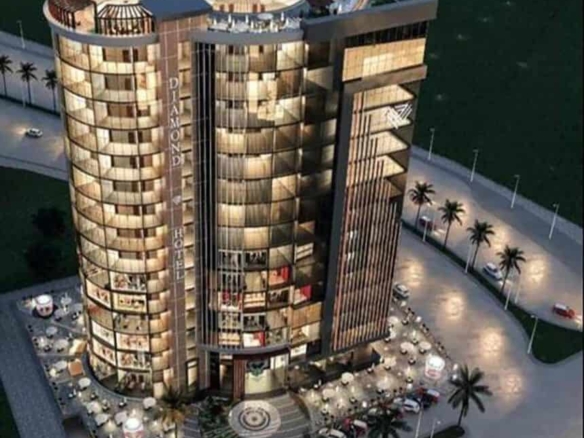 محل 90 م للبيع فى دايموند تويستد تاور العاصمة الادارية